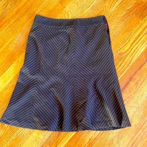 Brown skirt with pink and white zig zag stripes